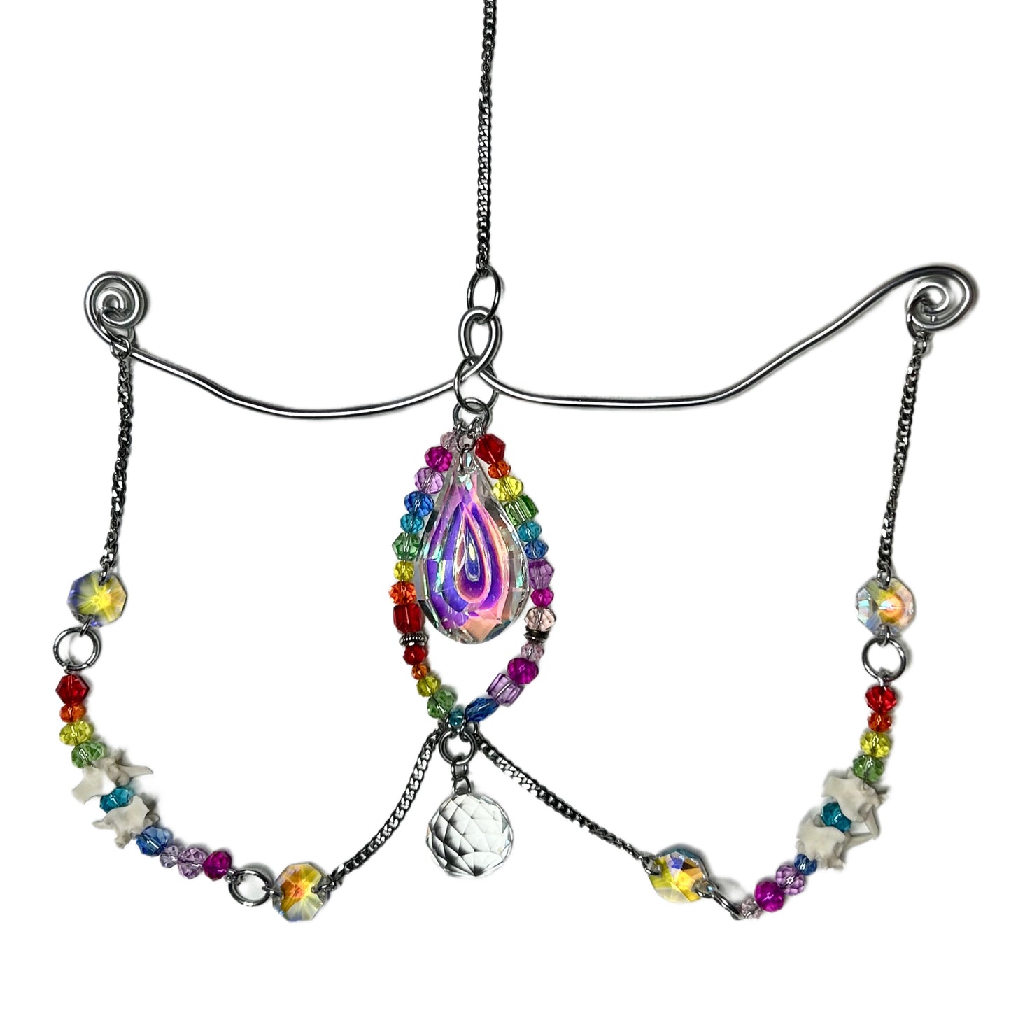 Rattlesnake vertebrae rainbow Sun Catcher